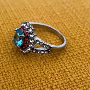 Glamour faux gemstone and blue diamond ring.
